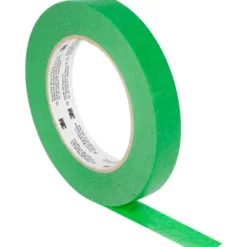Green masking tape roll isolated on white background.