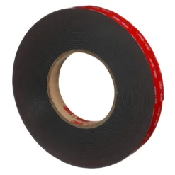 Roll of black adhesive tape, red branding strip