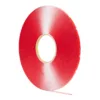 Red roll of double-sided tape.