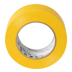 Yellow adhesive tape roll on white background.