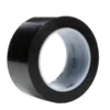 Black adhesive tape roll on white background