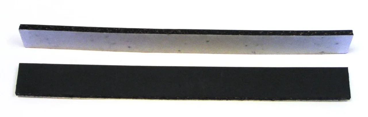 Two rectangular rubber steel laminated pads.