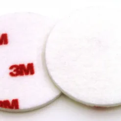 Two round white 3M pads.