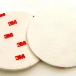 Two 3M buffing pads on white background