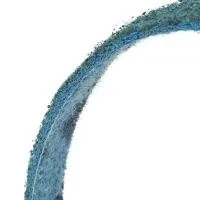 Close-up of a textured blue curved surface.