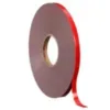 Red adhesive tape roll isolated on white background
