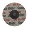 Scotch-Brite abrasive disc, gray with red text.
