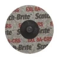 Scotch-Brite abrasive disc, gray with red text.