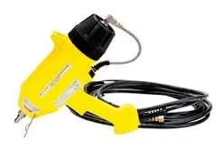 Yellow sandblasting gun with black hose