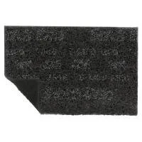 Black rectangular doormat with corner flipped up.