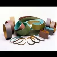 Assorted sanding belts in various sizes and colors.