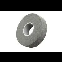 Gray abrasive grinding wheel on white background.
