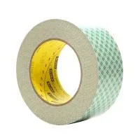 Green adhesive tape roll with yellow core