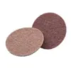 Two round abrasive pads for sanding surfaces.