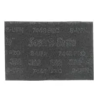 Industrial abrasive pad with printed text details.