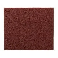 Brown abrasive scrub pad for cleaning surfaces
