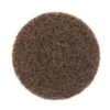 Brown circular abrasive pad for cleaning surfaces.