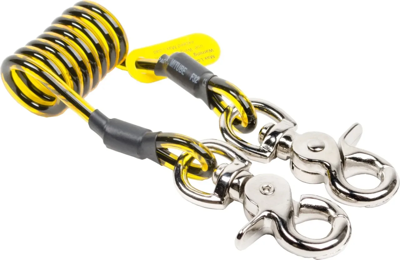 Yellow coiled cable with metal clips