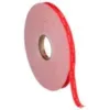 Red double-sided adhesive tape roll