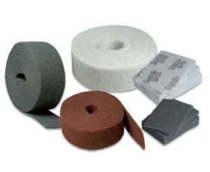Rolls and sheets of abrasive cleaning pads.